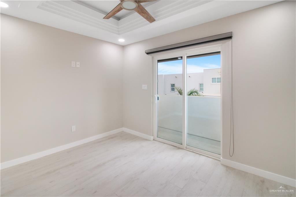 2202 Corales Street Mission, TX 78573 - Photo 6 of 18 Spare room featuring ceiling fan and recessed lighting