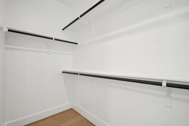 a view of a room with racks on the wall