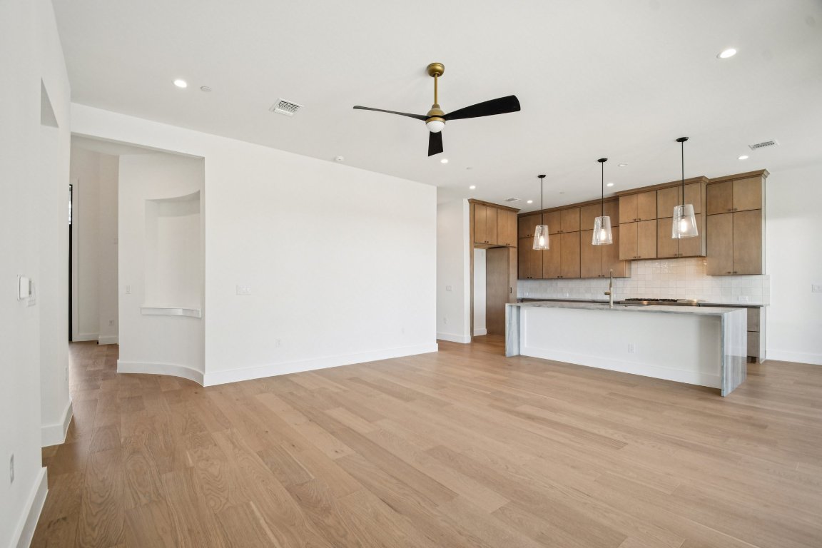 5903 Moondust Lane Austin, TX 78730 - Photo 6 of 37 a view of kitchen with refrigerator and window