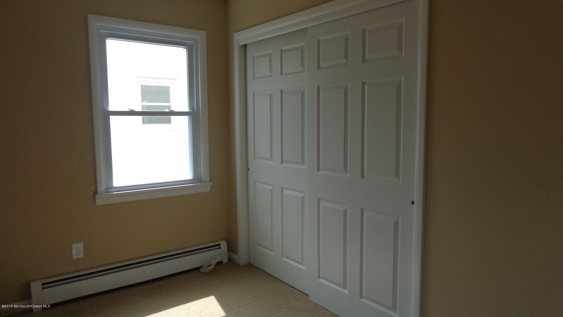 4 Garrett Road Toms River, NJ 08757 - Photo 12 of 19 a view of an empty room with a window
