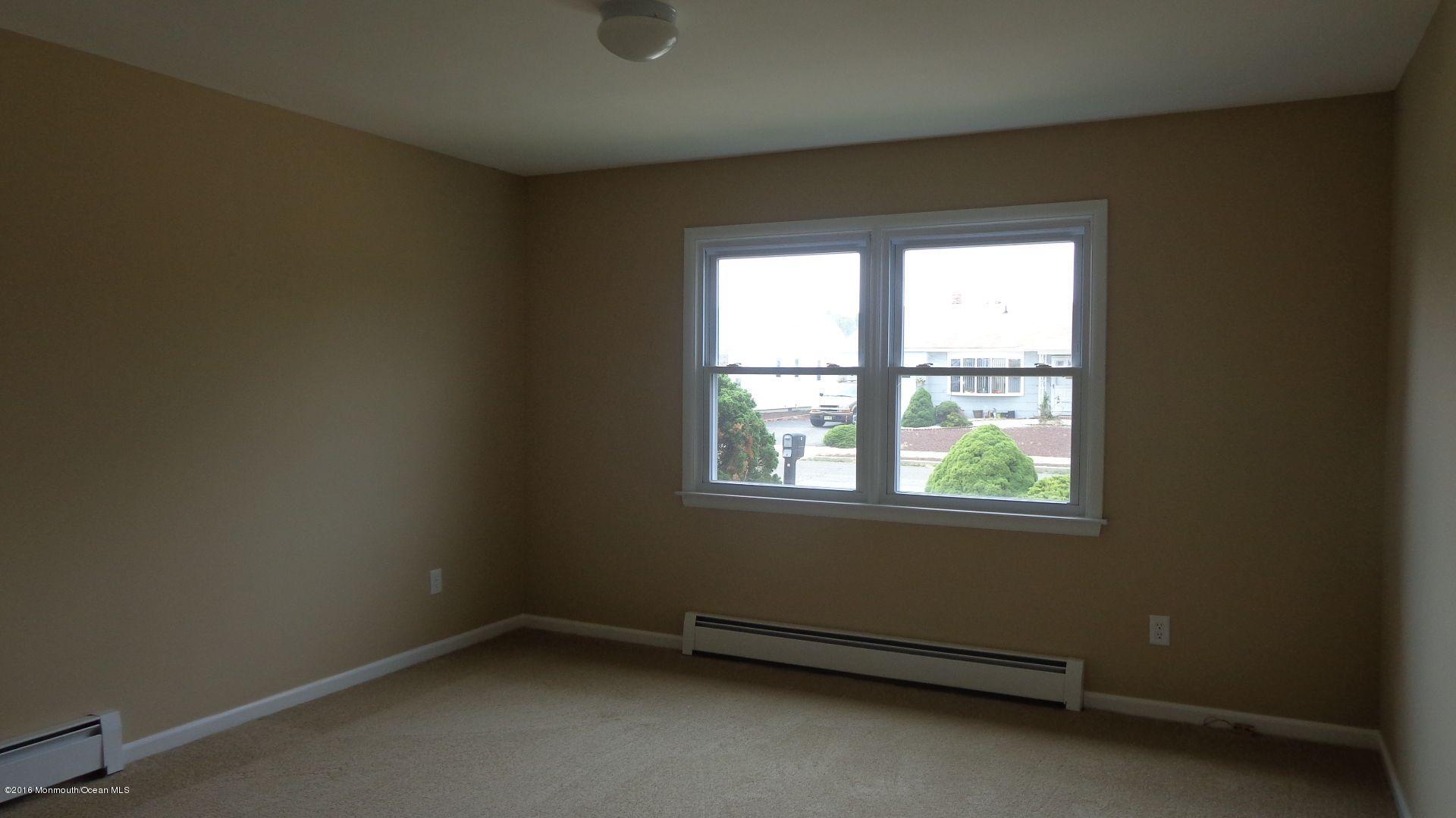 4 Garrett Road Toms River, NJ 08757 - Photo 13 of 19 an empty room with a window