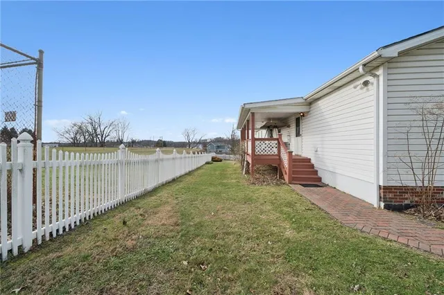 a view of a street with a building in the background