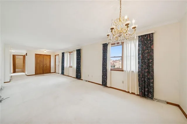 a view of a room with an empty space