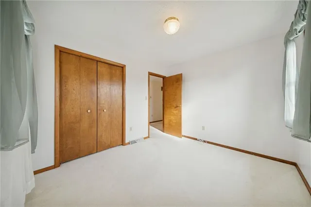 a view of a room with a hallway