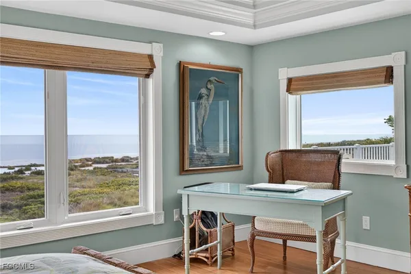 a workspace with furniture and a window