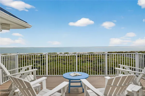 a view of a balcony with a chair