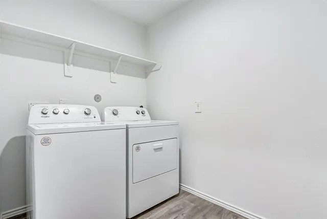 a utility room with dryer and washer