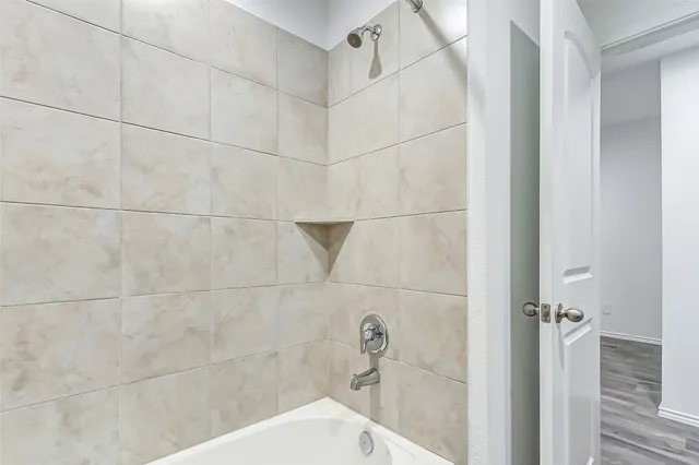 a bathroom with a bathtub