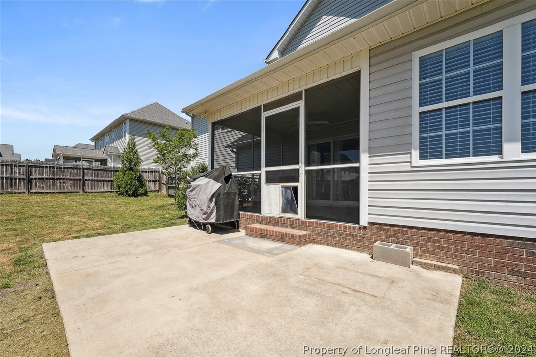 176 Vandercroft Way Bunnlevel, NC 28323 - Photo 33 of 36 a front view of a house with garden
