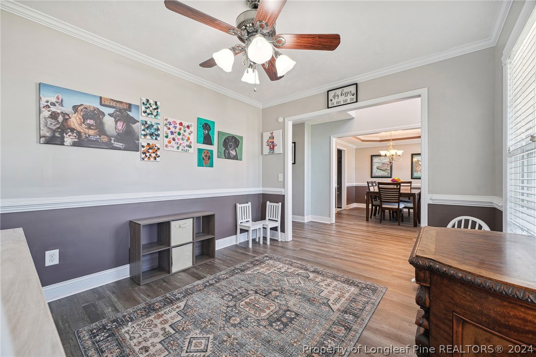 176 Vandercroft Way Bunnlevel, NC 28323 - Photo 6 of 36 a living room with furniture and a rug