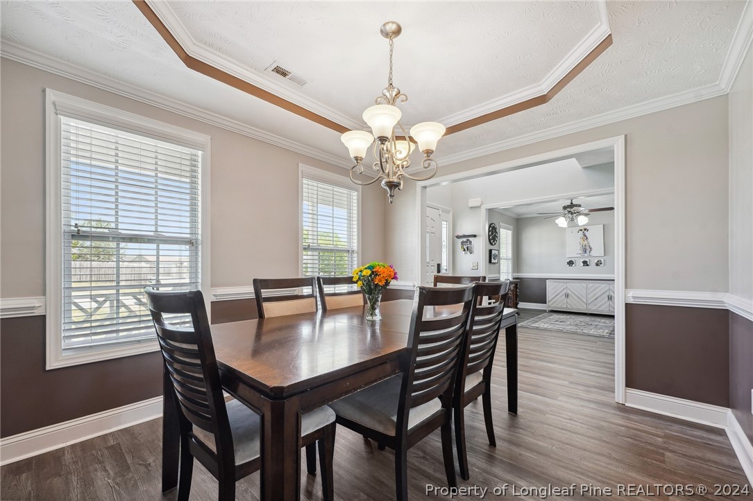 176 Vandercroft Way Bunnlevel, NC 28323 - Photo 8 of 36 a view of a dining room with furniture and window