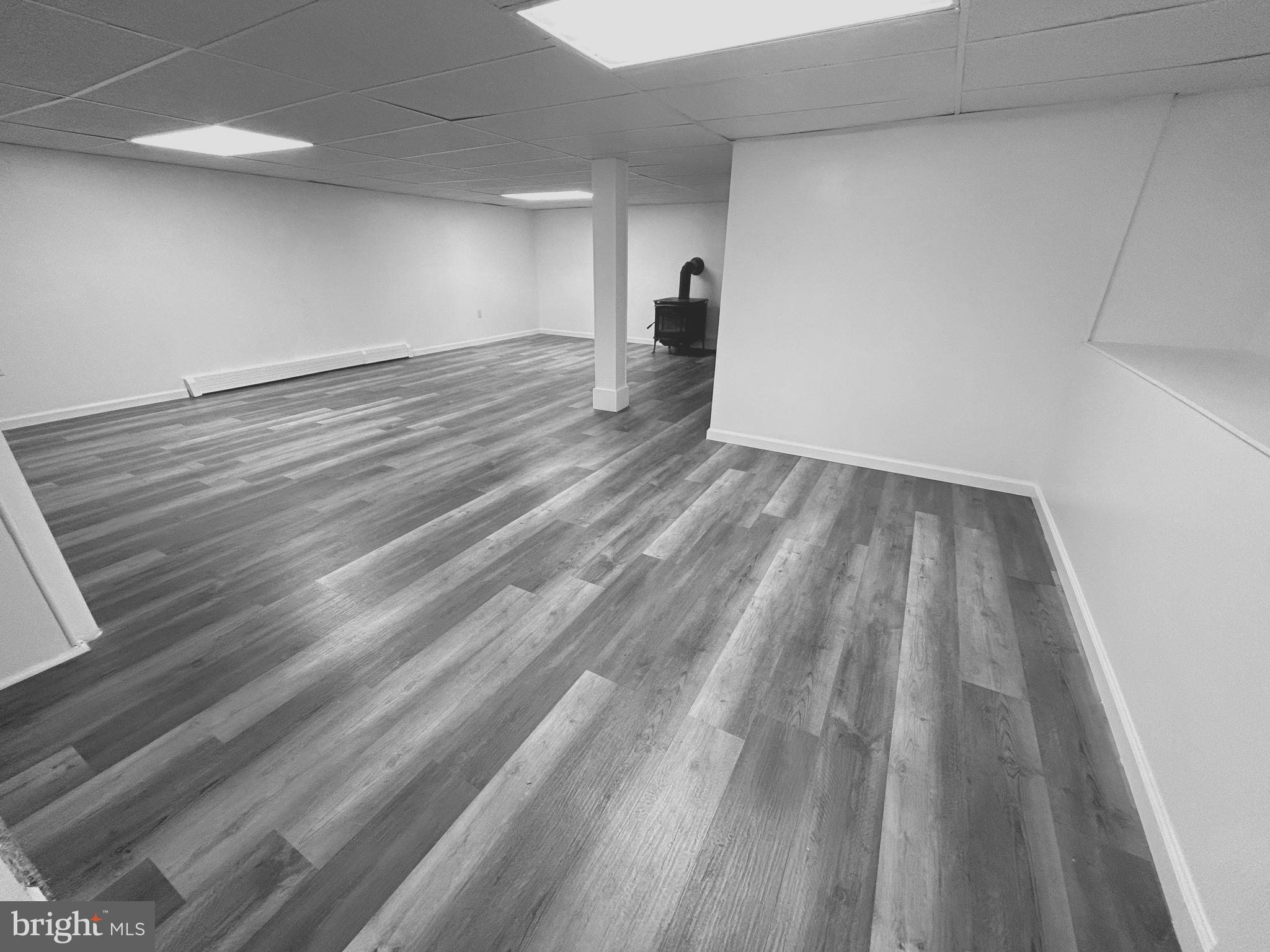 446 Stracks Dam Road Myerstown, PA 17067 - Photo 47 of 56 Finished Lower Level with Wood Laminate Flooring