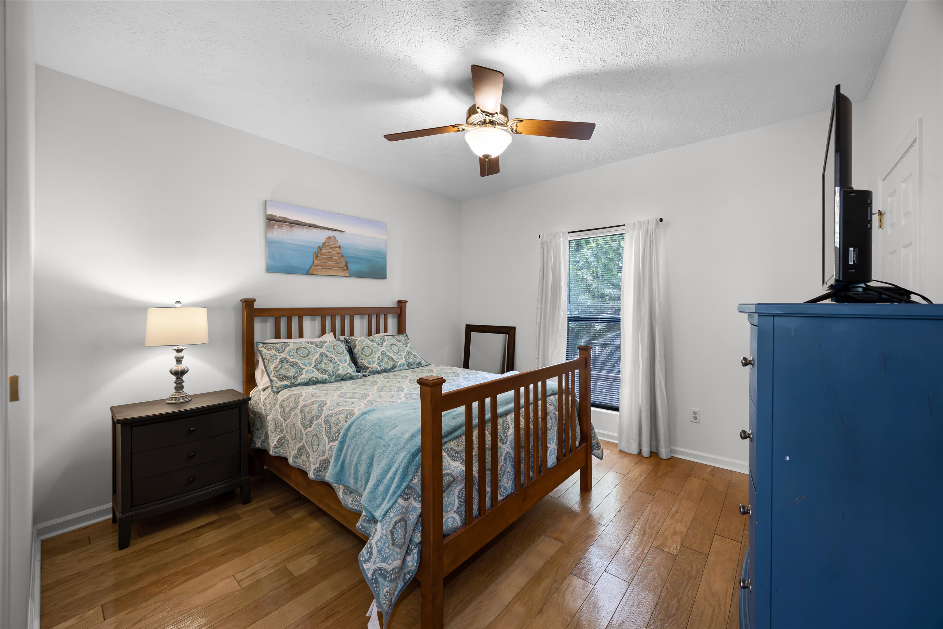 70 Point Clear Cove Savannah, TN 38372 - Photo 22 of 25 Bedroom with hardwood / wood-style floors, ceiling fan