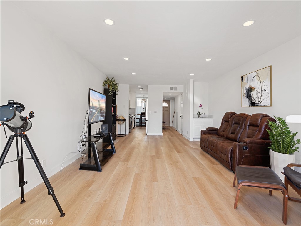 1 3rd Place, Unit 2 Long Beach, CA 90802 - Photo 11 of 55 a living room with furniture and a wooden floor