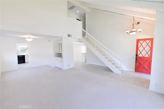 a view of an entryway with stairs