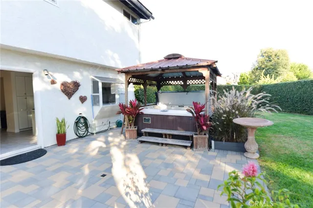 a bedroom with furniture and a garden