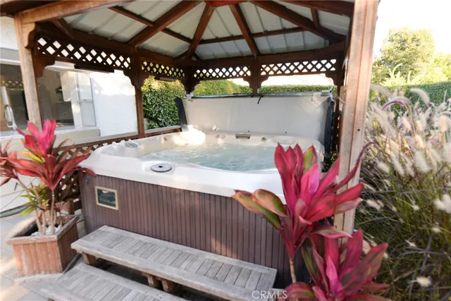 a view of a backyard with a tub