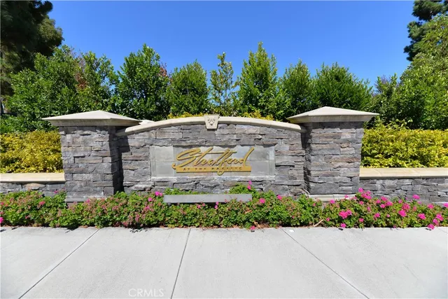 aerial view of a house with a yard and a garden