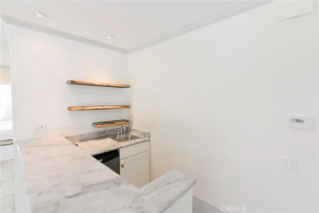 a room with storage and utility