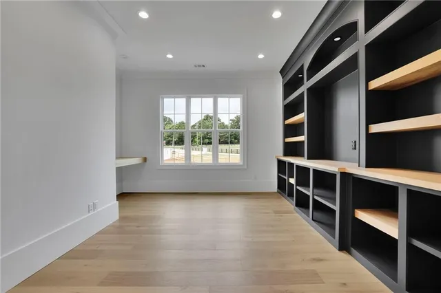 a bathroom with a sink vanity and a mirror