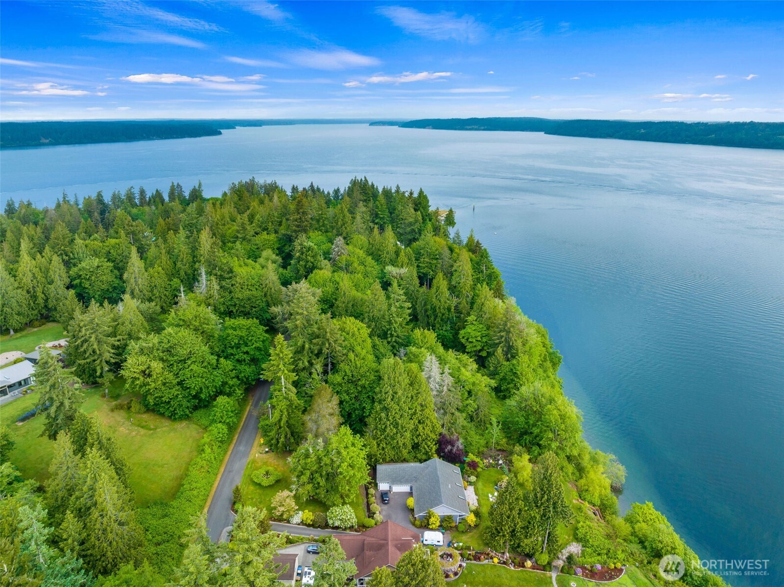9728 Cascade Loop Northeast Olympia, WA 98516 - Photo 3 of 13 a view of a yard with an outdoor space