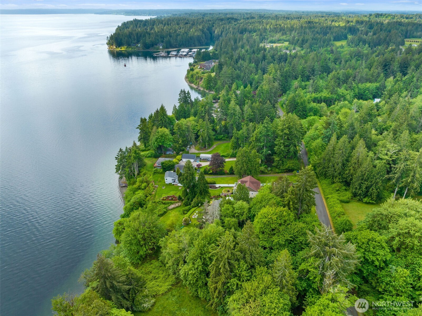 9728 Cascade Loop Northeast Olympia, WA 98516 - Photo 10 of 13 a view of a lake with a park
