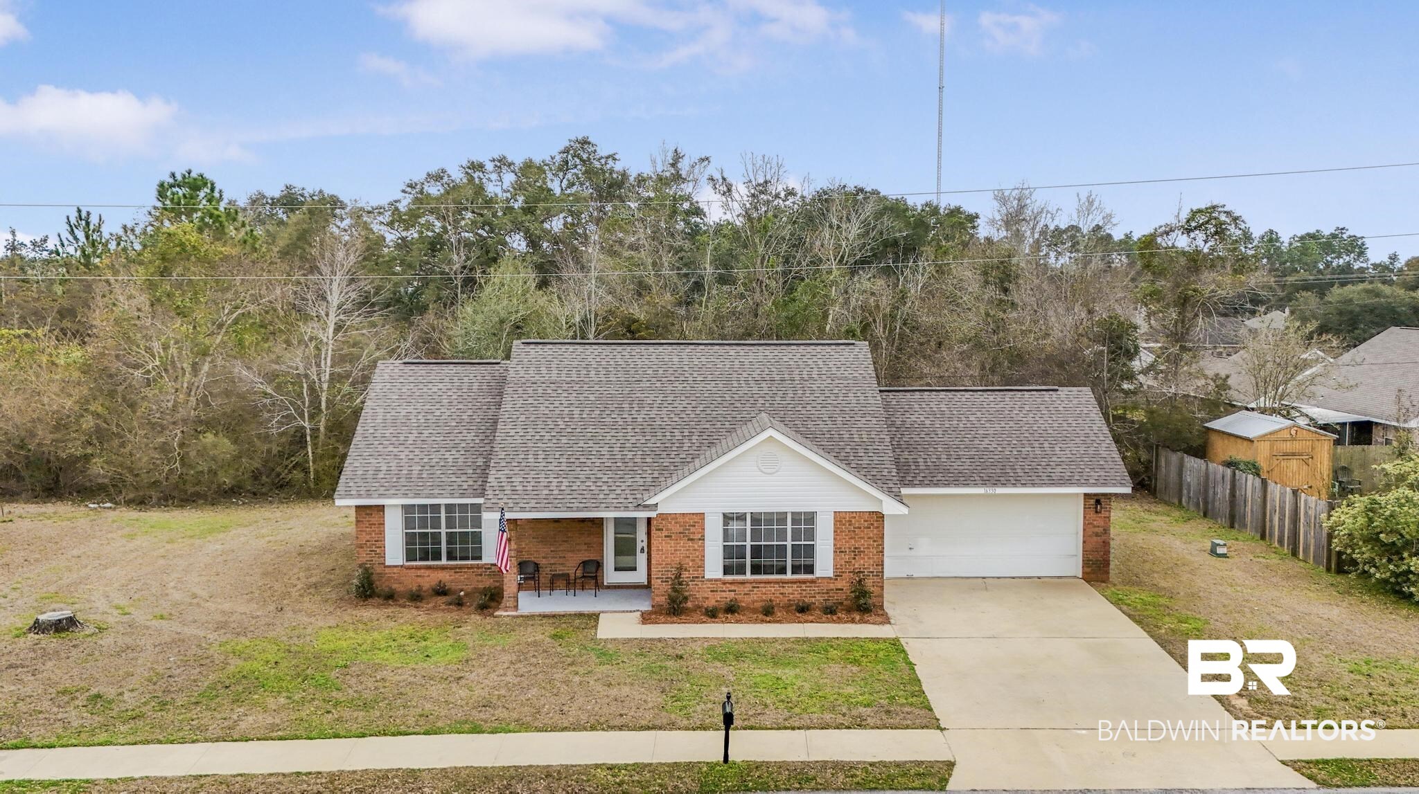 16330 Absalom Street Foley, AL 36535 - Photo 4 of 42 View of front of property with a garage and a front yard