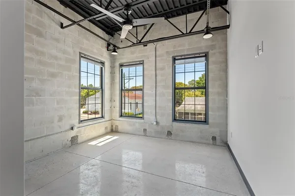 a view of an empty room with a window