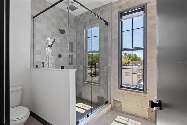 a bathroom with a sink and a window