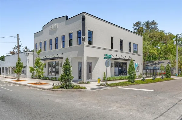 a front view of a building with yard