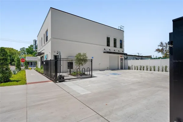 a view of a house with a street