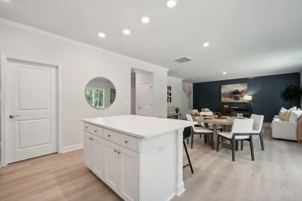 a view of a kitchen and dining room