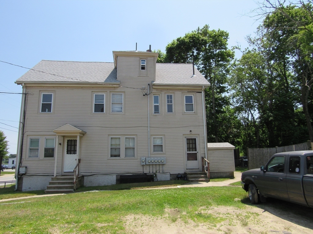 290 Main Street Wareham, MA 02571 - Photo 3 of 11 a view of a house with a yard