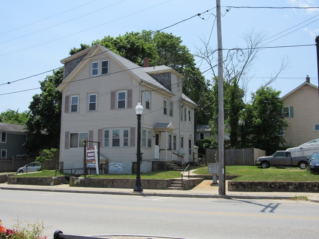290 Main Street Wareham, MA 02571 - Photo 10 of 11 a front view of a house with a yard