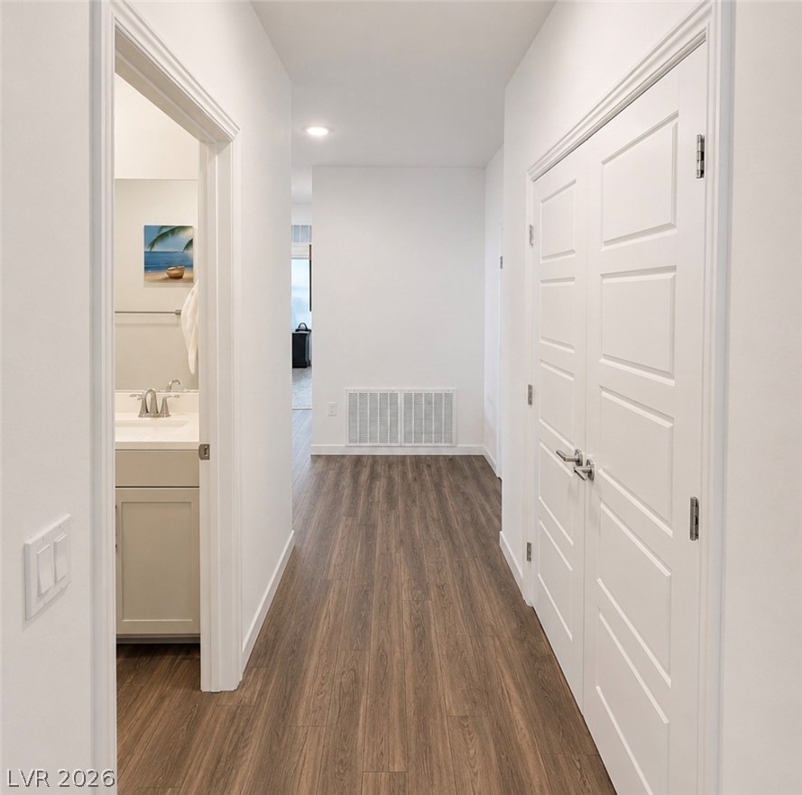 2555 Hampton Road, Unit 4205 Henderson, NV 89052 - Photo 18 of 52 This bright hallway connects spaces with clean lines and durable flooring.