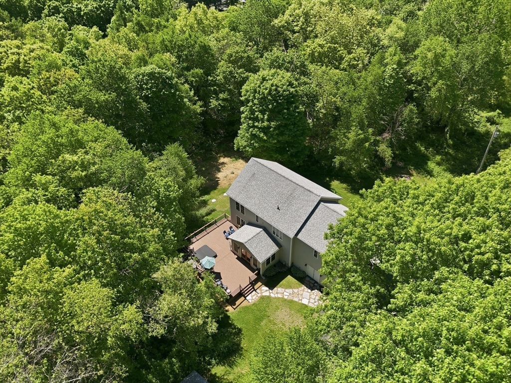 345 Bragg Road Warren, MA 01585 - Photo 39 of 41 an aerial view of a house with a yard