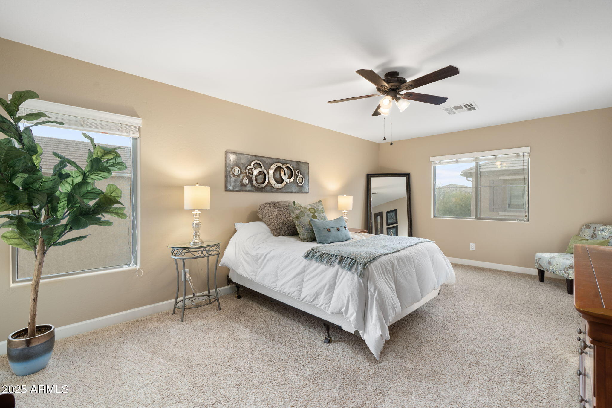 1705 East Joseph Way Gilbert, AZ 85295 - Photo 16 of 39 a bed room with a bed and a window