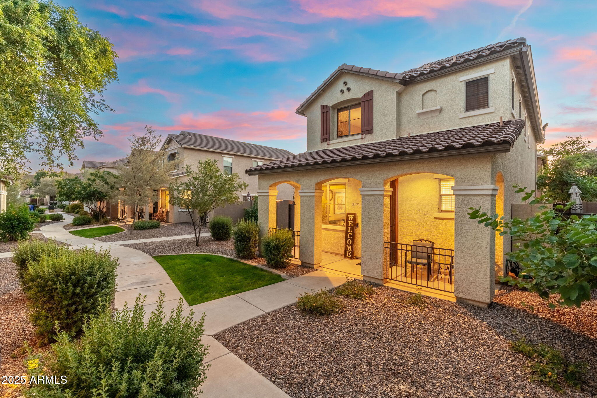 1705 East Joseph Way Gilbert, AZ 85295 - Photo 2 of 39 a front view of a house with garden