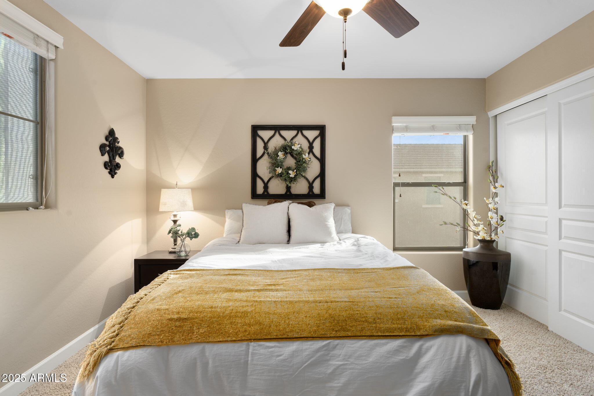 1705 East Joseph Way Gilbert, AZ 85295 - Photo 21 of 39 a bedroom with a bed and a painting on the wall