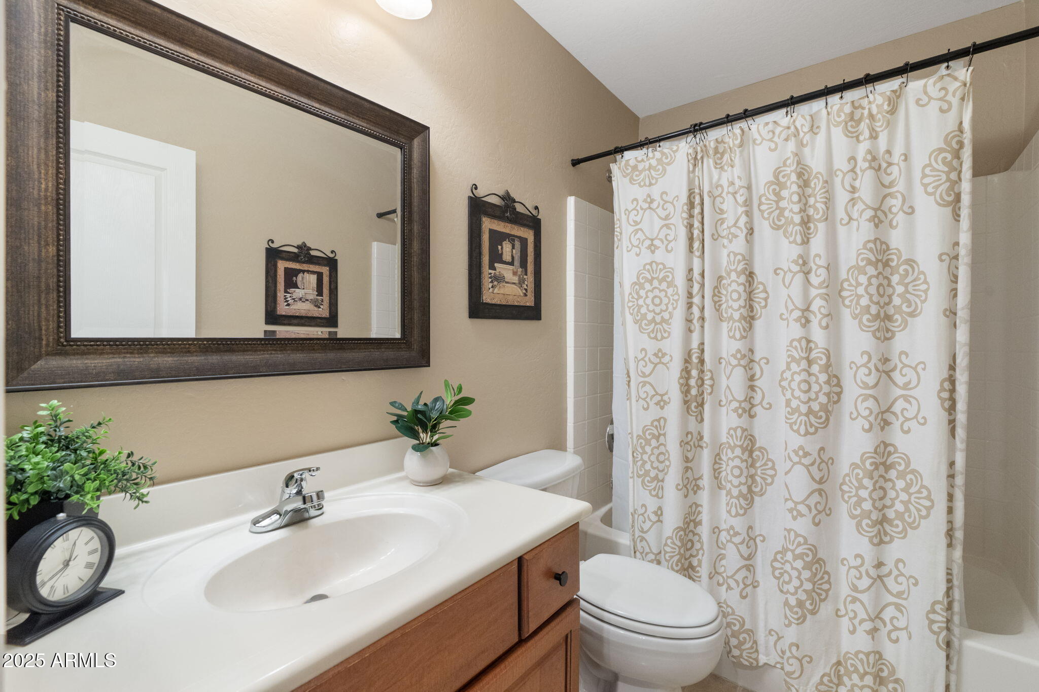 1705 East Joseph Way Gilbert, AZ 85295 - Photo 24 of 39 a bathroom with a sink a toilet and a mirror