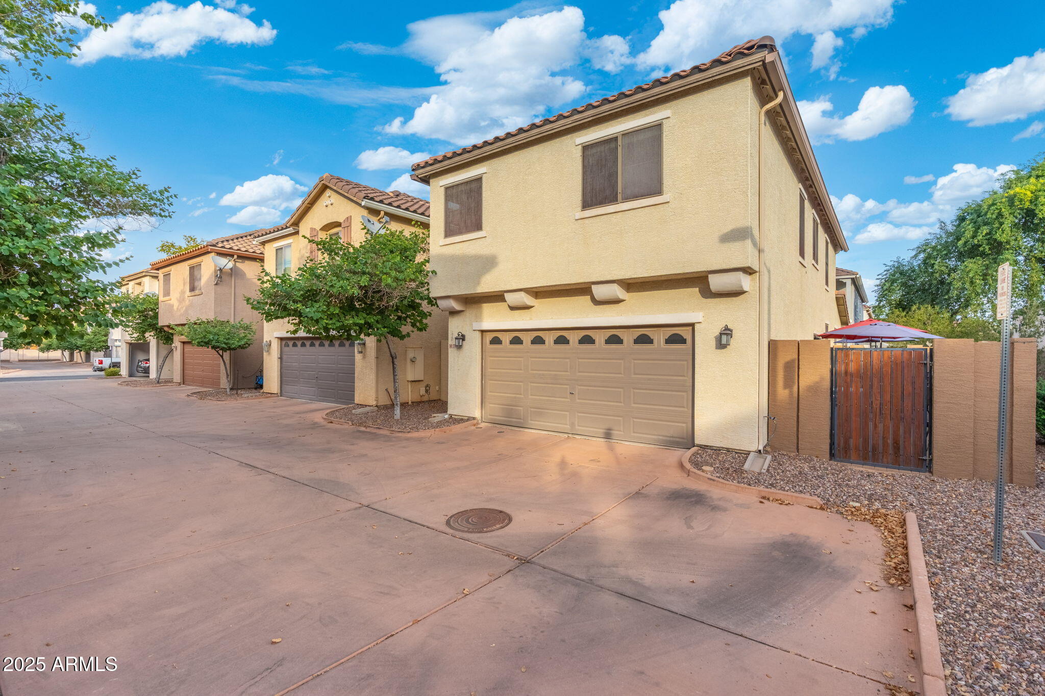 1705 East Joseph Way Gilbert, AZ 85295 - Photo 30 of 39 a view of a house with a yard and garage