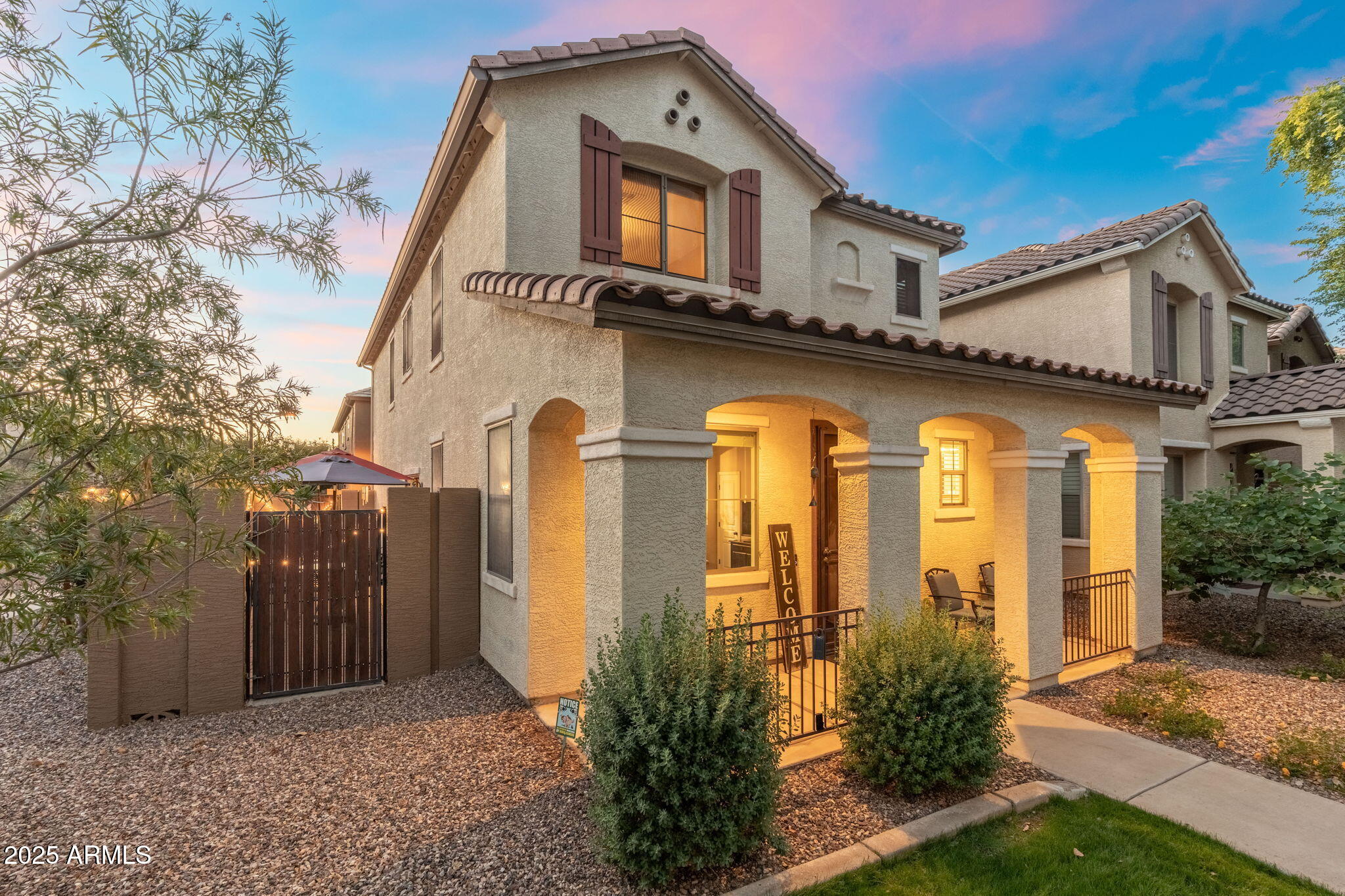 1705 East Joseph Way Gilbert, AZ 85295 - Photo 3 of 39 a front view of a house with garden