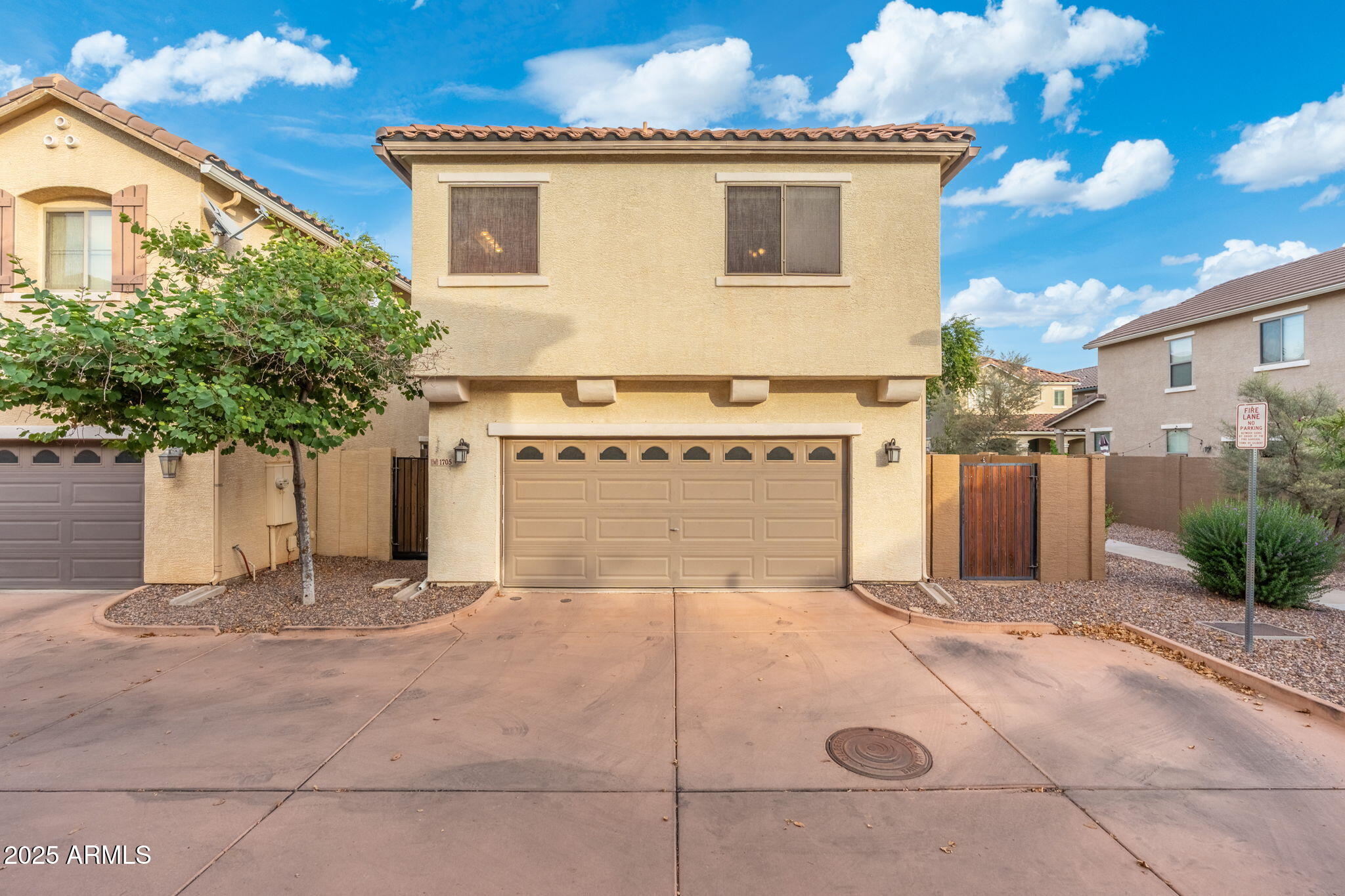 1705 East Joseph Way Gilbert, AZ 85295 - Photo 31 of 39 a front view of a house with a garage