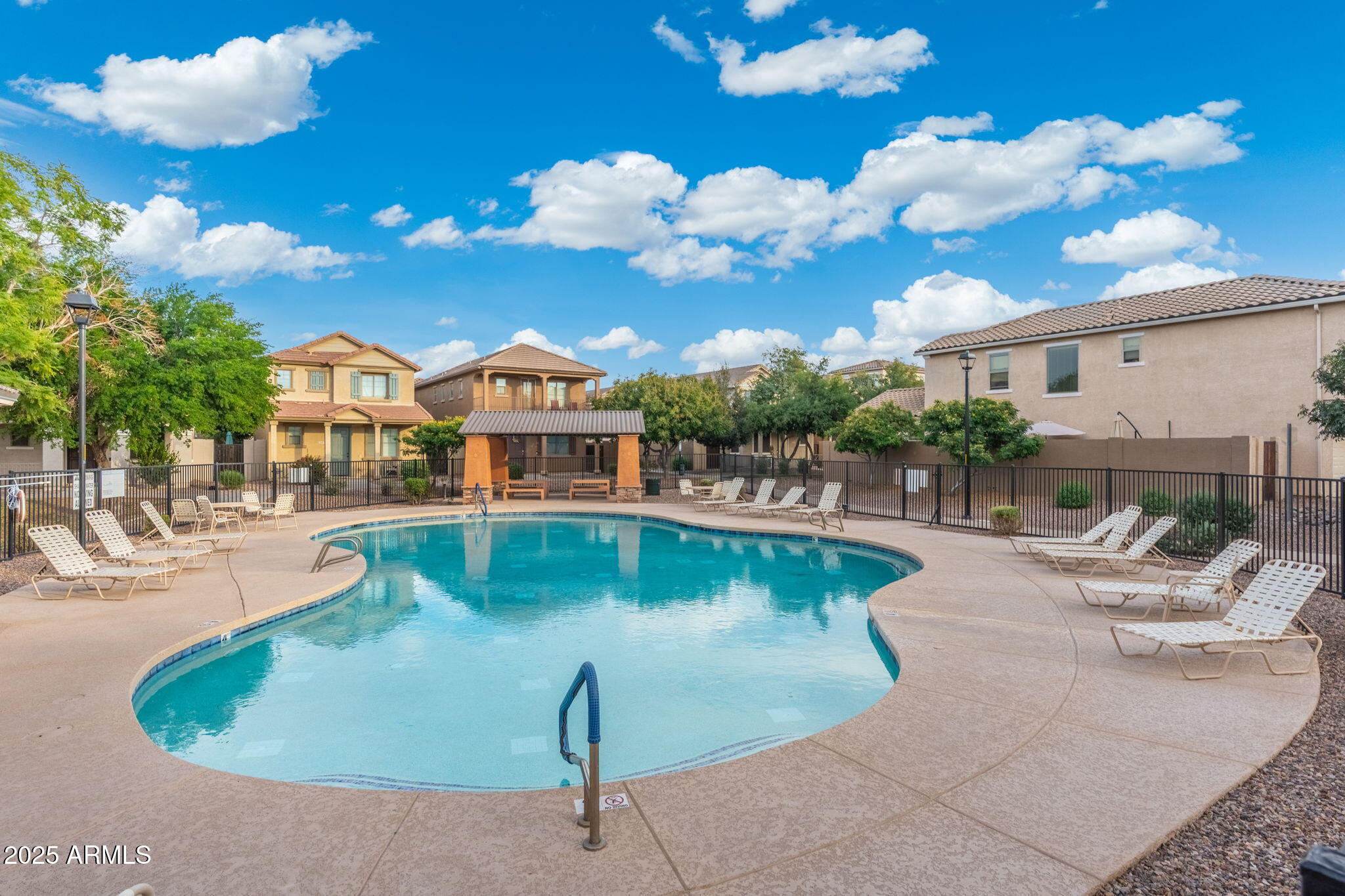1705 East Joseph Way Gilbert, AZ 85295 - Photo 33 of 39 a view of a swimming pool with outdoor seating