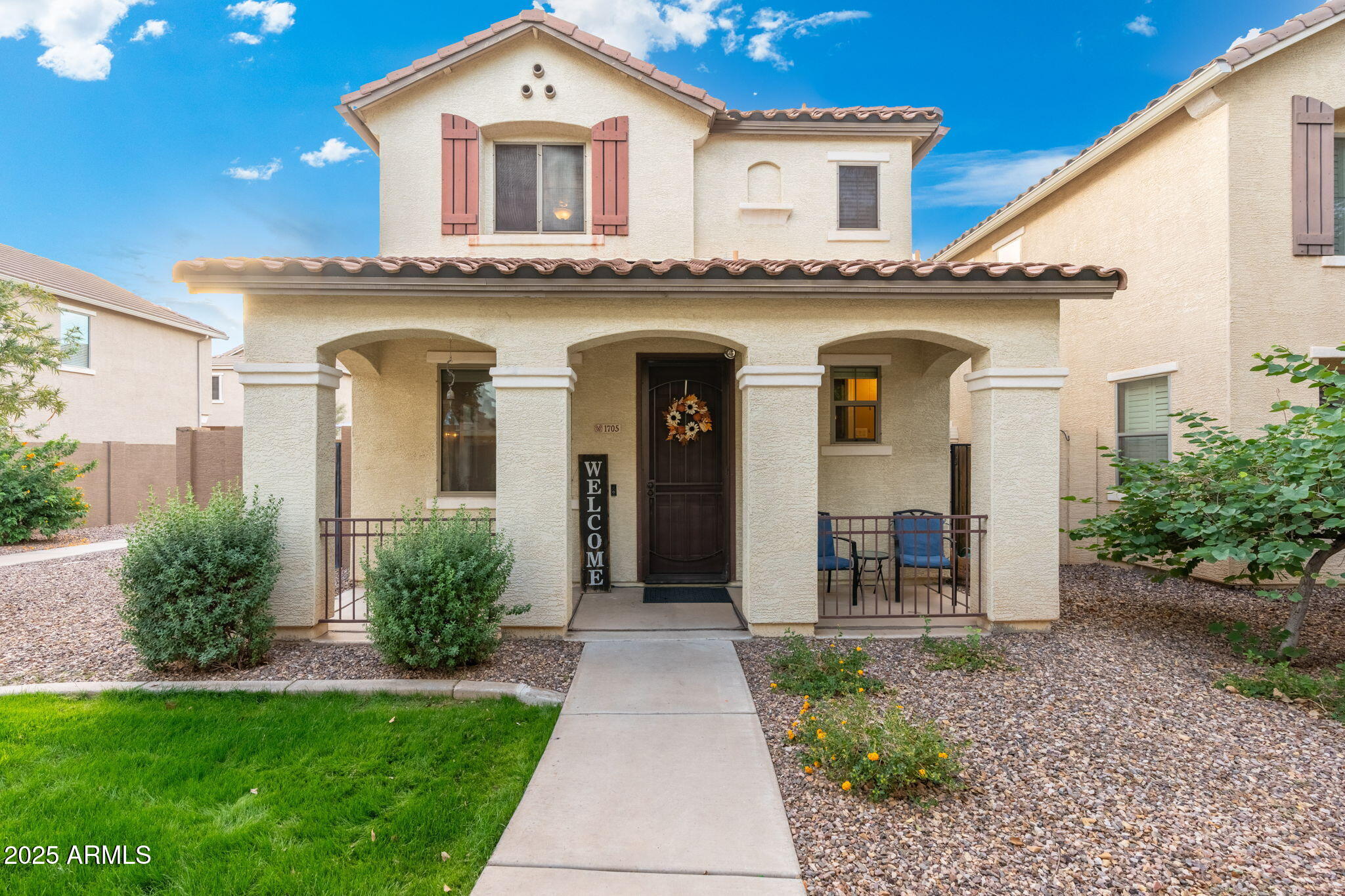 1705 East Joseph Way Gilbert, AZ 85295 - Photo 38 of 39 a front view of a house with garden