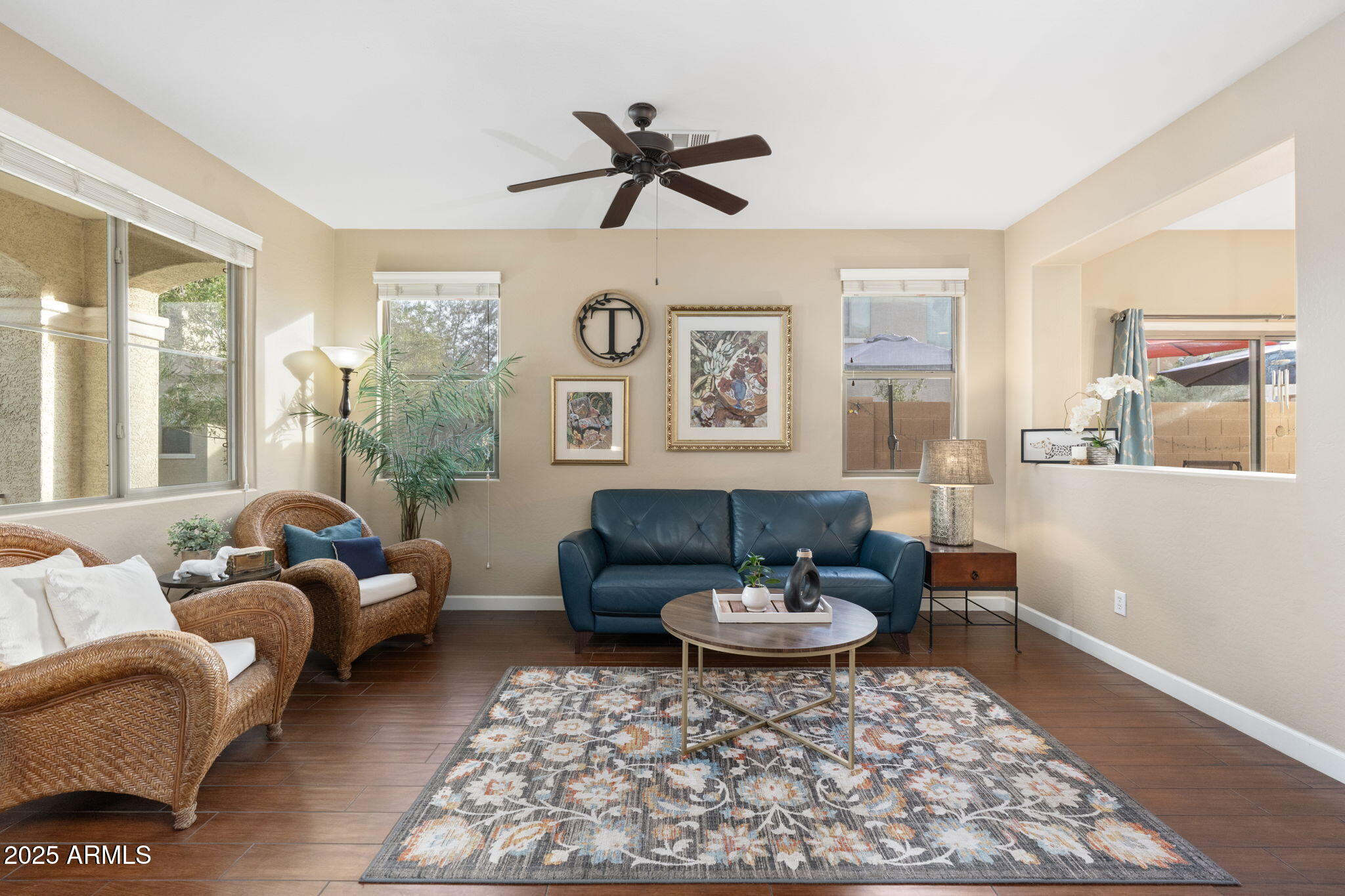 1705 East Joseph Way Gilbert, AZ 85295 - Photo 5 of 39 a living room with furniture and a rug