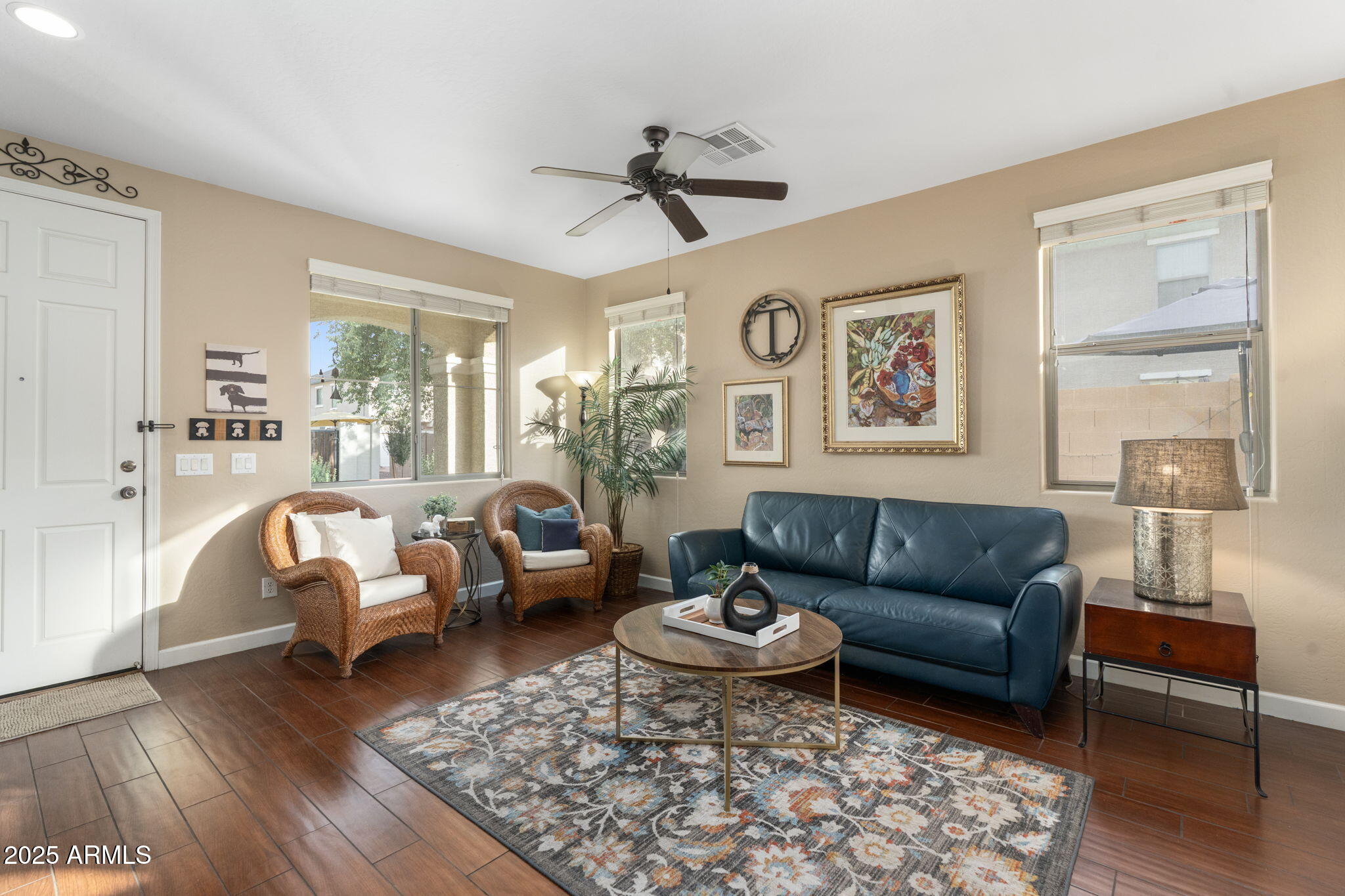 1705 East Joseph Way Gilbert, AZ 85295 - Photo 7 of 39 a living room with furniture and a large window