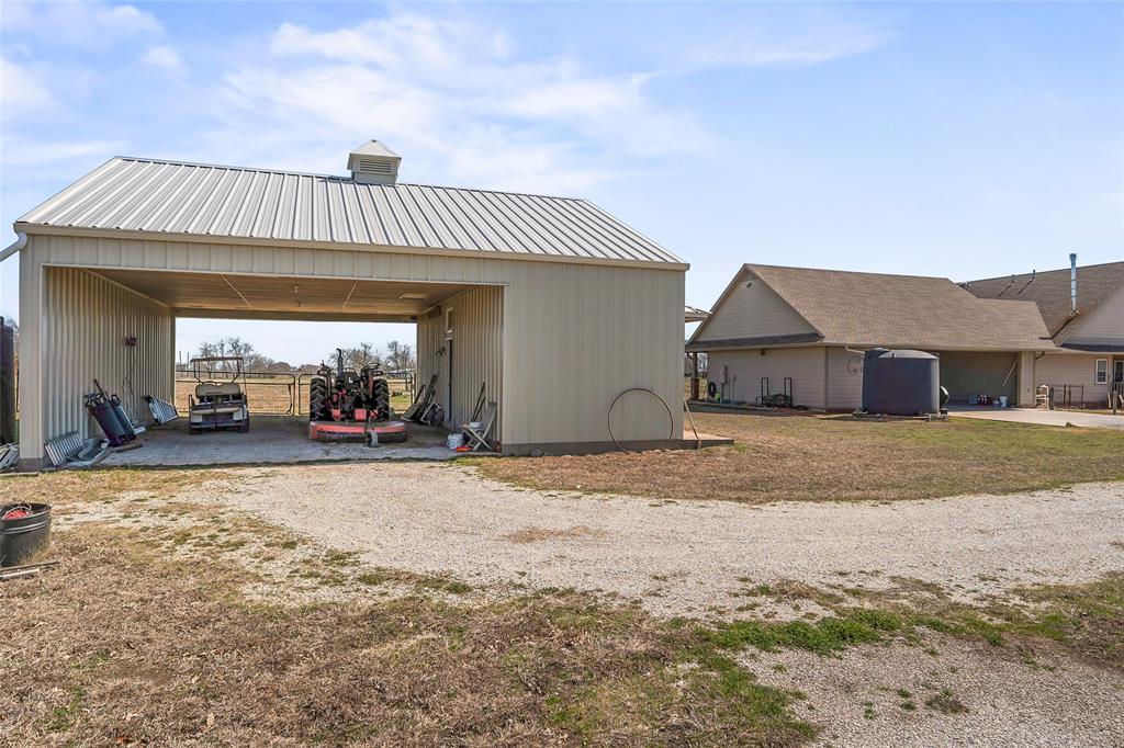 14410 Fm 455 Street West Decatur, TX 76234 - Photo 6 of 40 a view of a house with a yard