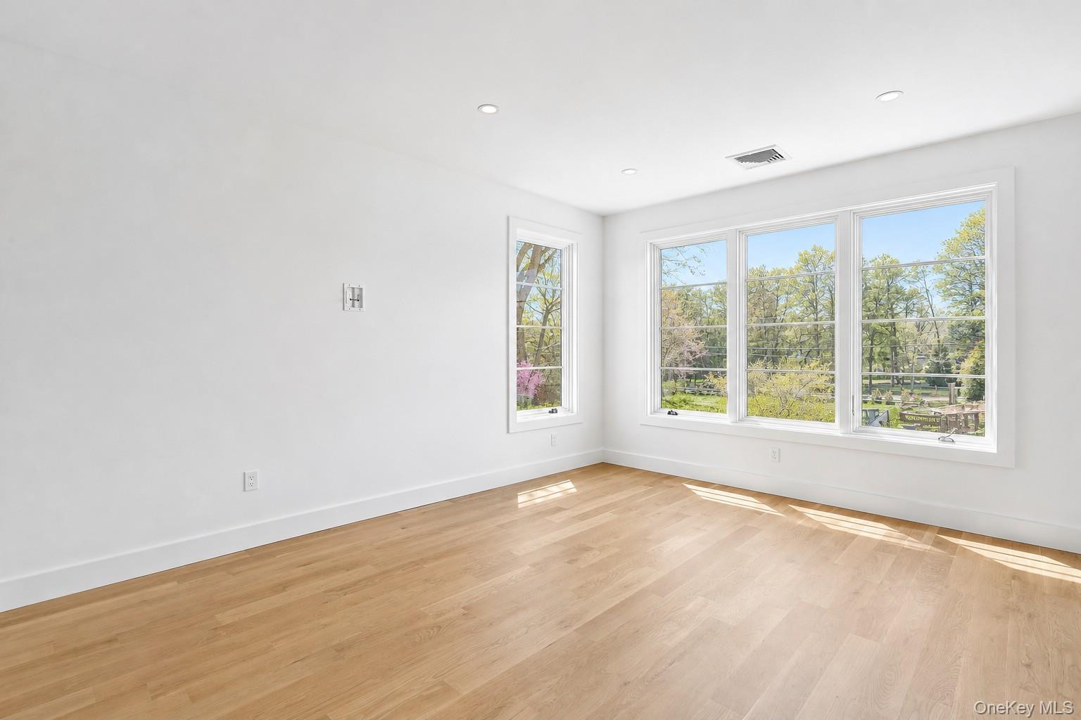 14 Ridge Road Southampton, NY 11968 - Photo 17 of 23 a view of an empty room with a window