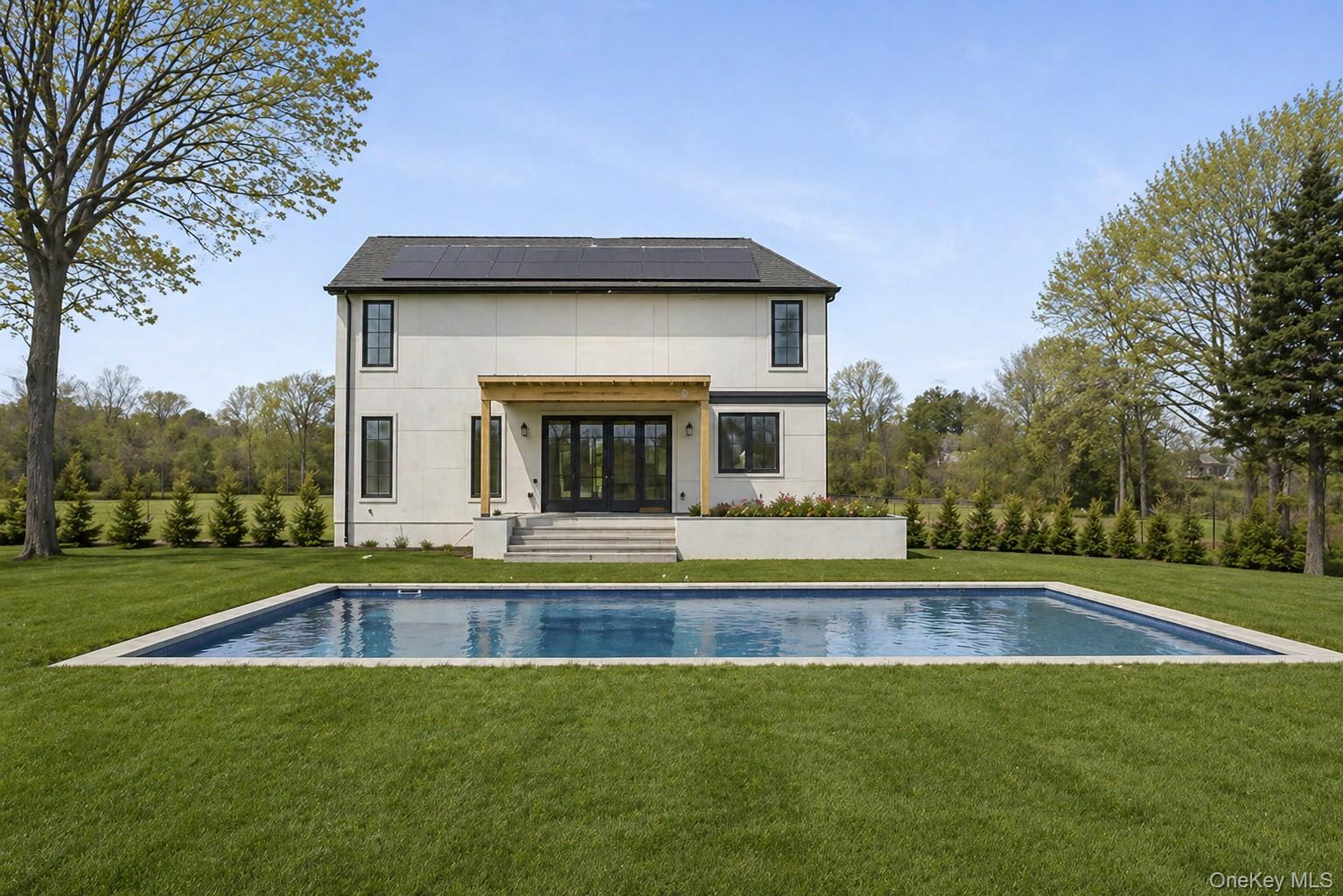 14 Ridge Road Southampton, NY 11968 - Photo 21 of 23 a view of pool with an outdoor space